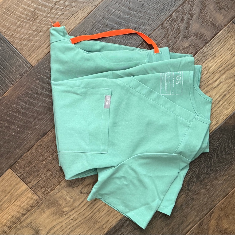 Mint Figs jogger Scrub Set with Orange Accent